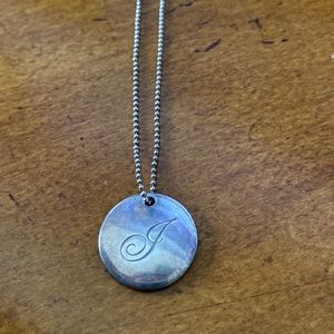 Woman’s J disc Tiffany & Co